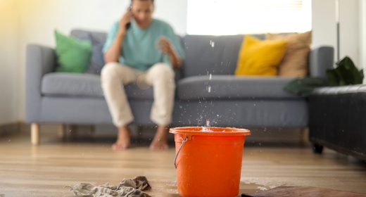 frustrated-person-dealing-with-a-leaky-roof-at-hom-2026-03-24-07-41-35-utc frustrated-person-dealing-with-a-leaky-roof-at-hom-2026-03-24-07-41-35-utc